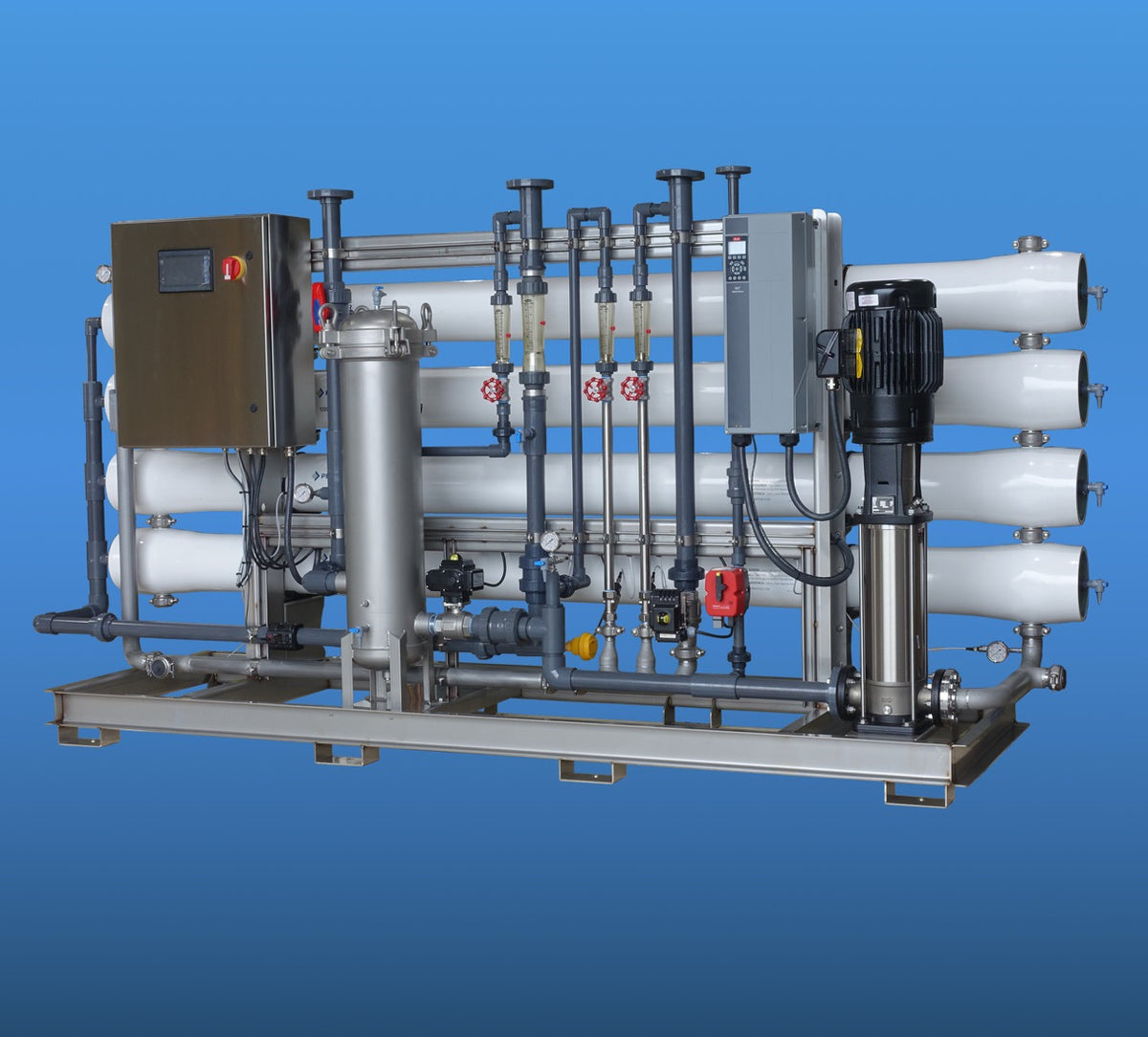 Industrial water treatment system with pipes, valves, and a control panel.