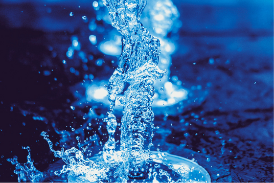 Flowing water with blue lighting effects.