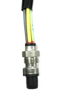Metal connector with multiple colored wires.