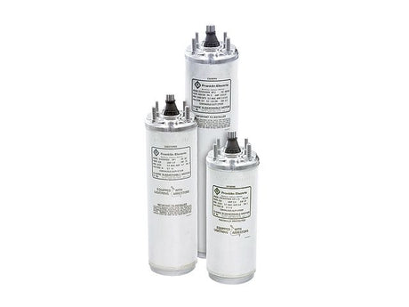 Three cylindrical electric capacitors with metal casings and labels.