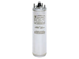 Electric motor capacitor with a silver metal casing and label.