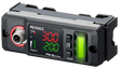 KEYENCE FD-Q series sensor with digital display and output connections.