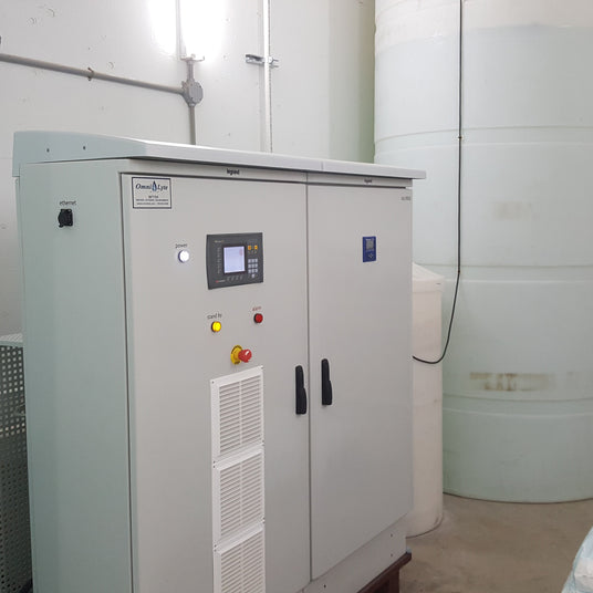 Control panel in a utility room with indicators and buttons.