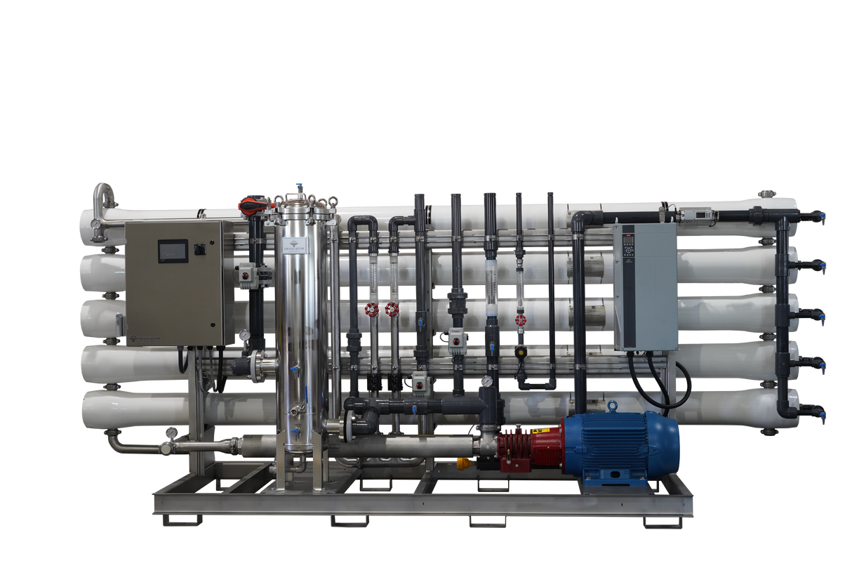Industrial water filtration system with multiple pipes and a blue motor.