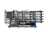 Industrial water filtration system with multiple pipes and a blue motor.