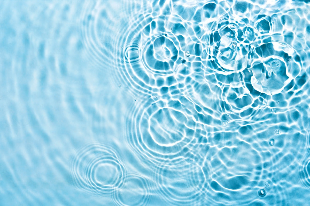Ripples on a blue water surface.